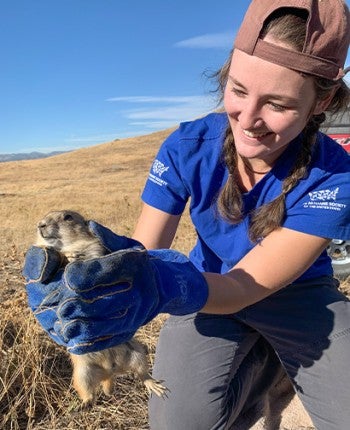 Jessie Albright holds a prairie dog