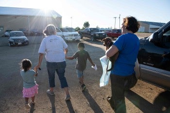 A family leaving a vet clinic