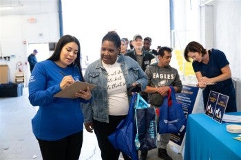 People talking in line