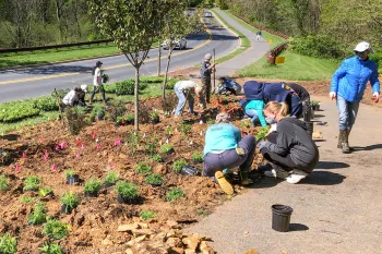 Neighbors working in a community garden