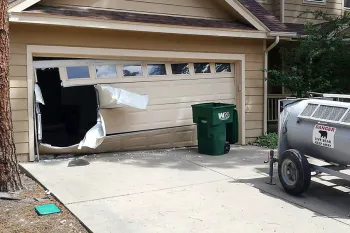 Remains of a garage door busted open by a bear.