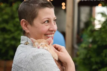 woman holding kitten at KC Pet Project event