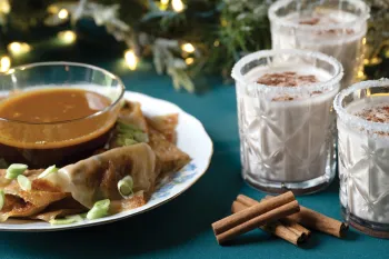 A beautiful holiday spread of mushroom potsticker dumplings and coconut nog.