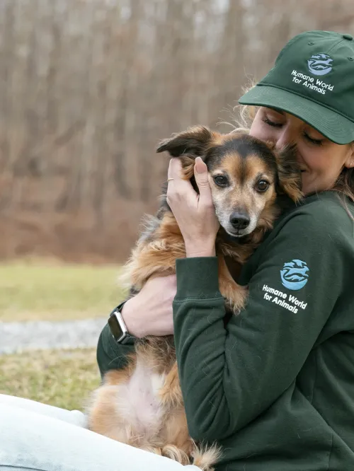 Humane World for Animals employee with their dog, Flea